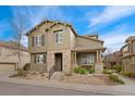 Inviting home exterior with a covered front porch and well-maintained landscaping at 10618 Clearview Ln, Highlands Ranch, CO 80126