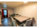 Bright dining area features an elegant marble table and gray upholstered chairs for comfortable gatherings at 10050 Holland Ct, Broomfield, CO 80021