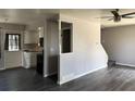 Bright living room featuring modern flooring and an open concept, perfect for entertaining and Gathering gatherings at 10050 Holland Ct, Broomfield, CO 80021