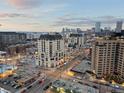 A high-angle view showing the residences with city skyline and city streets at 975 N Lincoln St # 4F, Denver, CO 80203