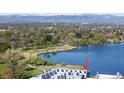 Aerial view of the home's proximity to the lake and park, providing ample outdoor recreation opportunities at 3101 W 47Th Ave # 13, Denver, CO 80211
