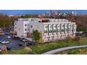 Exterior view of the building showcasing modern architecture and a well-maintained facade at 3101 W 47Th Ave # 13, Denver, CO 80211