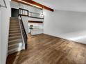 Open living area with hardwood floors and a loft at 2685 S Dayton Way # 74, Denver, CO 80231