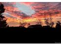 Beautiful sunset over the neighborhood, captured with vibrant colors painting the sky at 2190 S Uravan St, Aurora, CO 80013