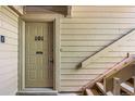 The unit's front door is conveniently located next to exterior stairs at 4070 S Atchison Way # 101, Aurora, CO 80014