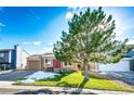 Ranch-style home with attached garage and landscaped yard at 8923 Prickly Pear Cir, Parker, CO 80134