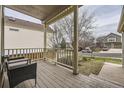 Inviting front porch provides outdoor seating, and a peaceful view of the neighborhood at 21562 Omaha Ave, Parker, CO 80138