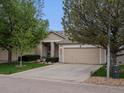 Charming single-Gathering home with well-maintained landscaping and attached two-car garage at 8240 Clayton Ct, Denver, CO 80229