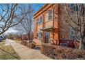 Exterior view of the home from down the street, showing its curb appeal at 7777 E 1St Pl # 110, Denver, CO 80230