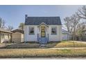 Charming one-story home with an attached garage and well-kept landscaping at 4354 Chase St, Denver, CO 80212