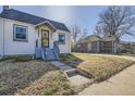 Charming home featuring a well-maintained front yard and inviting entrance at 4354 Chase St, Denver, CO 80212
