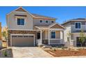 Charming two-story home featuring stone accents and a covered front porch at 459 S Salida St, Aurora, CO 80017