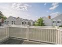 View from balcony featuring gray siding townhouses with white accents at 3331 S Monaco Pkwy # D, Denver, CO 80222