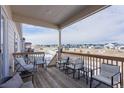 Deck with seating area overlooking a neighborhood view at 7033 S Waterloo Way, Aurora, CO 80016