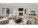 Inviting living room with a fireplace, large windows, and a comfortable seating area at 2660 S University Blvd # I, Denver, CO 80210