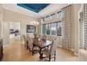 Dining room with dark wood table, stylish chairs, and scenic views at 814 Neville Ln, Golden, CO 80401