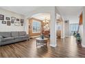 Spacious living room with hardwood floors and ample natural light at 1705 Peridot Ct, Castle Rock, CO 80108