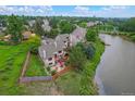 Scenic aerial view of the townhome with pond access and outdoor patio at 12668 W 1St Pl # 81, Denver, CO 80228