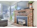 Brick fireplace with a built in entertainment center at 2253 Columbine Ave, Boulder, CO 80302