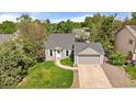 Charming single-Gathering home with a well-manicured lawn and an attached two-car garage in a lovely neighborhood at 904 Clover Cir, Lafayette, CO 80026
