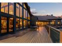 Spacious deck with seating area, offering scenic views and outdoor dining at 28940 Pinewood Vista Dr, Evergreen, CO 80439