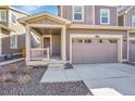 Charming two-story home featuring a covered porch and attached two-car garage, perfect for suburban living at 17836 Gallup St, Broomfield, CO 80023