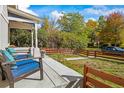 Inviting front porch with comfortable seating, perfect for relaxing and enjoying the outdoors at 3317 W 37Th Ave, Denver, CO 80211