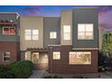 Charming townhome with modern architecture, featuring mixed materials and a cozy entrance at 11213 Colony Cir, Broomfield, CO 80021