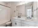 Clean bathroom with double vanity and subway tile at 5009 Hickory Oaks St, Castle Rock, CO 80104