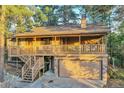 Inviting two-story home featuring a charming covered porch and a convenient two-car garage at 9416 Mcshane Ct, Parker, CO 80134