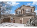 Charming two-story home featuring a two-car garage, brick accents and beautiful landscaping at 13486 Clayton St, Thornton, CO 80241