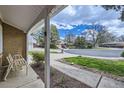 View of a cul-de-sac with well maintained lawns and mature trees at 3240 E 128Th Pl, Thornton, CO 80241