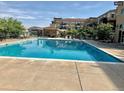 Large community pool with plenty of room to swim or relax and enjoy the day at 10176 Park Meadows Dr # 2403, Lone Tree, CO 80124