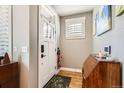 Bright entryway with wood floors and stylish decor at 1145 S Logan St, Denver, CO 80210