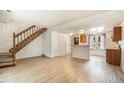 Open floor plan with modern floors, staircase and ample space for entertaining at 1545 S Ouray Cir # B, Aurora, CO 80017