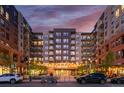 Apartment building exterior featuring many windows and private balconies on each unit at 20 Wilcox St # 410, Castle Rock, CO 80104