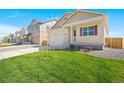 New construction homes with landscaping and driveways at 2268 Base St, Fort Lupton, CO 80621