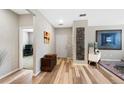 Welcoming entryway featuring stylish flooring and neutral walls, leading into the home's living spaces at 4500 Copeland Cir # 104, Highlands Ranch, CO 80126