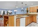 Bright kitchen featuring granite countertops, stainless steel appliances, and an eat-in island at 315 Arapahoe Ave # 202, Boulder, CO 80302