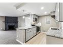Modern kitchen with stainless steel appliances and granite countertops at 18004 E Ohio Ave # 101, Aurora, CO 80017