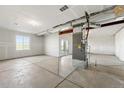 Unfinished basement with concrete floors, utility connections, and potential for customization at 8816 Whiteclover St, Littleton, CO 80125