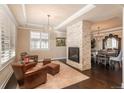 Inviting living room with a stone fireplace and comfortable seating at 22435 Boundstone Dr, Parker, CO 80138