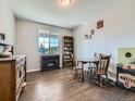 Cozy dining room with hardwood floors, natural light, and space for Gathering gatherings at 607 Azalea St, Brighton, CO 80601