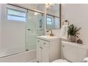 Modern updated bathroom with white subway tile and updated fixtures at 4727 E Bails Pl, Denver, CO 80222