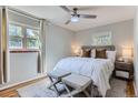Spacious bedroom with a comfortable bed and plenty of natural light at 4727 E Bails Pl, Denver, CO 80222