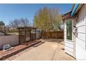 Private backyard featuring a concrete patio and a pergola at 4428 S Kalispell Cir, Aurora, CO 80015