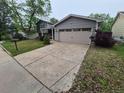 A charming home with a two-car garage and a well-maintained lawn at 1962 S Ivory Way, Aurora, CO 80013