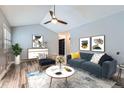 Bright living room with modern furnishings, stylish decor, and ample space at 2504 S Victor St # E, Aurora, CO 80014