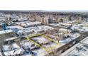 Aerial view of a house and lot in a residential neighborhood at 1435 Quebec St, Denver, CO 80220