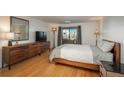 Bright bedroom with hardwood floors and ample closet space at 800 N Pearl St # 406, Denver, CO 80203